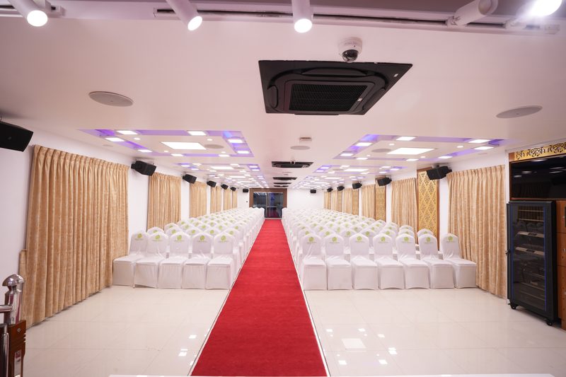 Red-carpet aisle to the stage