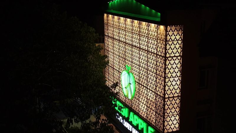 The facade from the air at night